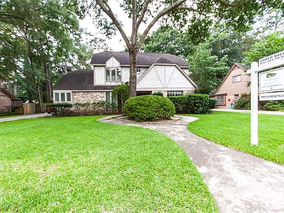 Beautiful, wooded lot in established Lakewood Forest.