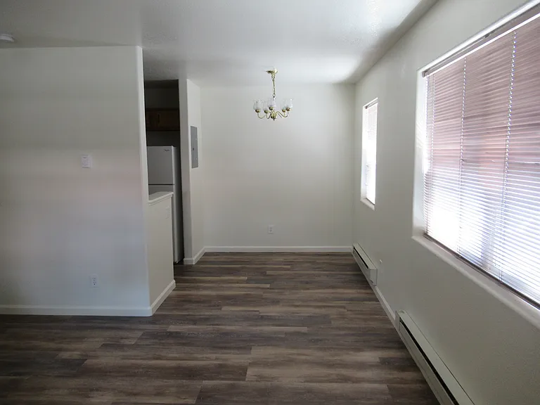 Most units now have Lifetime vinyl plank flooring downstairs. Some may have tile or carpet.