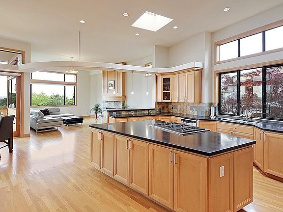 Kitchen opens up to living area.