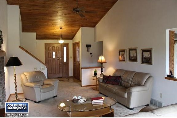 Striking LR w/wood ceiling