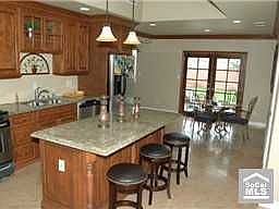 Spacious Kitchen Facing Large Backyard