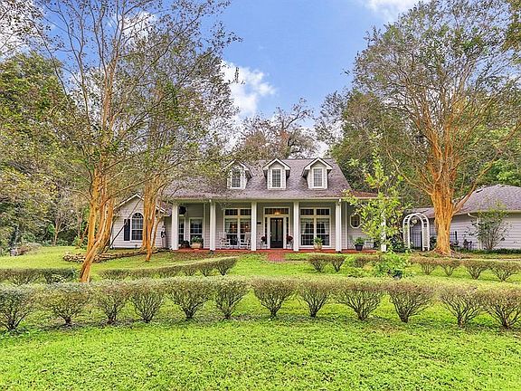 A beautiful front porch to welcome your guests.