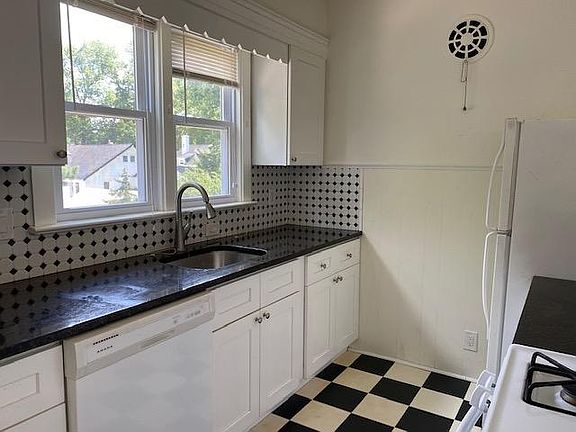 updated kitchen with granite counters