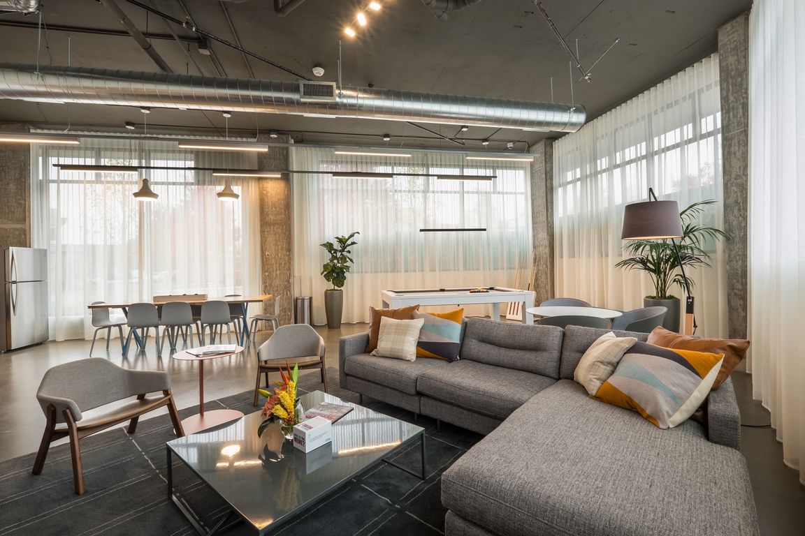 Crew Apartments Lounge Pool Table and Dining Table