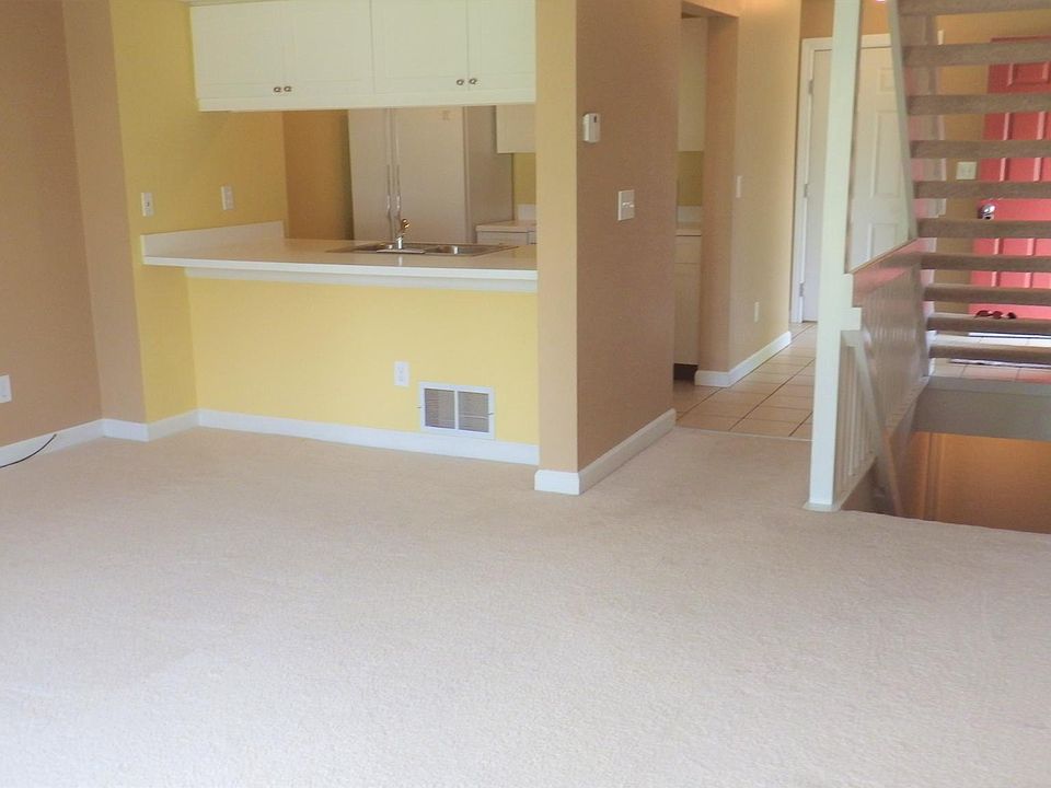 Looking from Living Room down hallway to Front Door.