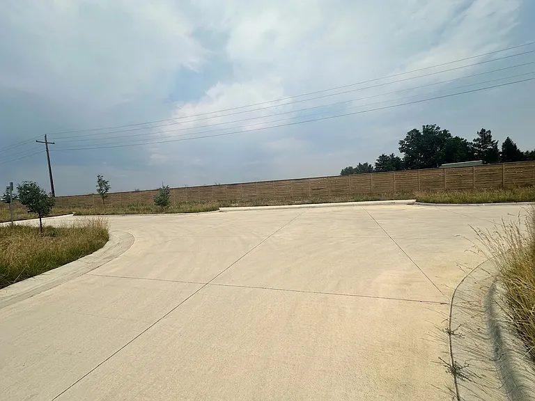 Additional private lot that is located next to the garages. 6 parking spaces that are almost always open. Great for guests!