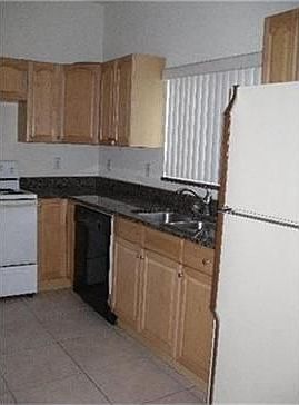5th image of 309 NE 35th Ct