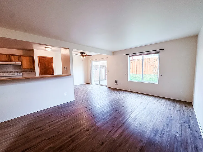 Living room looking at slider to back yard
