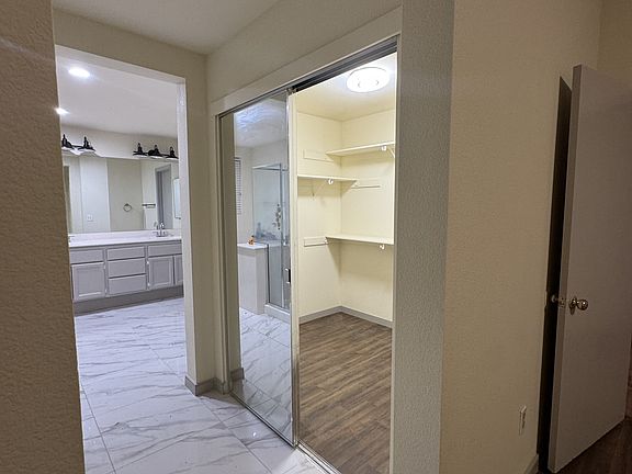 Master bedroom bathroom and walk in closet