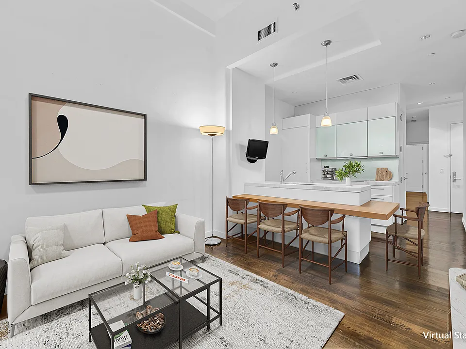 11 E 36th St #406