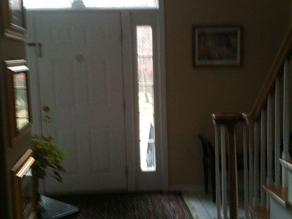 Front Entry with atrium window and cathedral ceiling