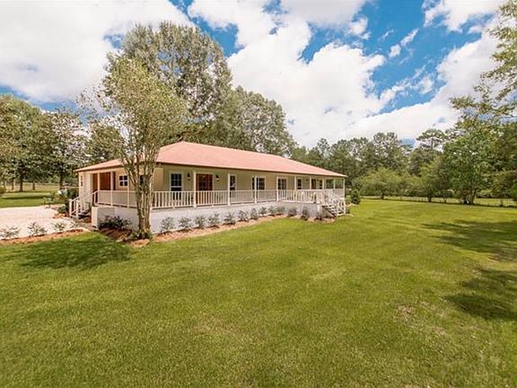 Rear view, wraparound porch