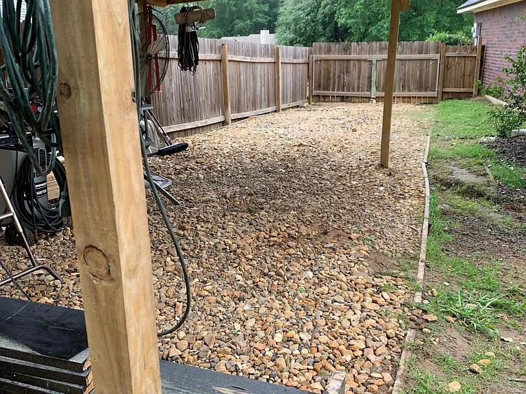 Parking area enclosed in backyard