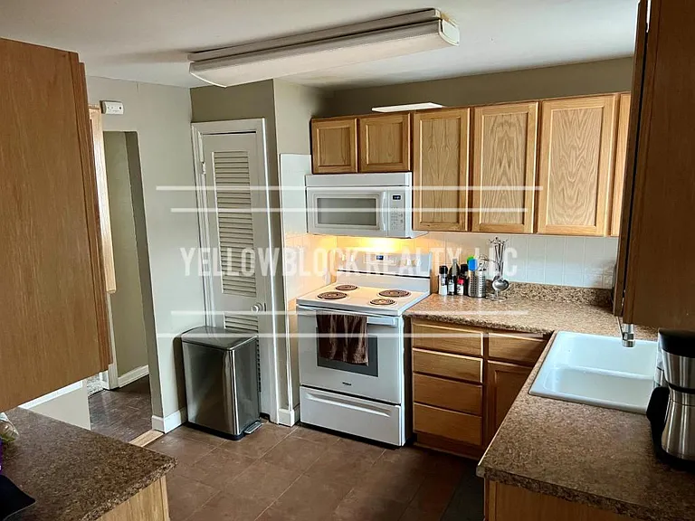 320 E 79th Ter — Photo 22