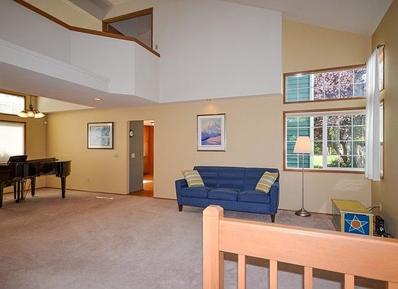 BAM ! You are in a SKYBRIDGE Floorplan !!!  Once you have seen this, it's what you WANT.  This plan is light filled and open.  Airy and Special.  Wow ~ that's a Baby Grand Piano there !
