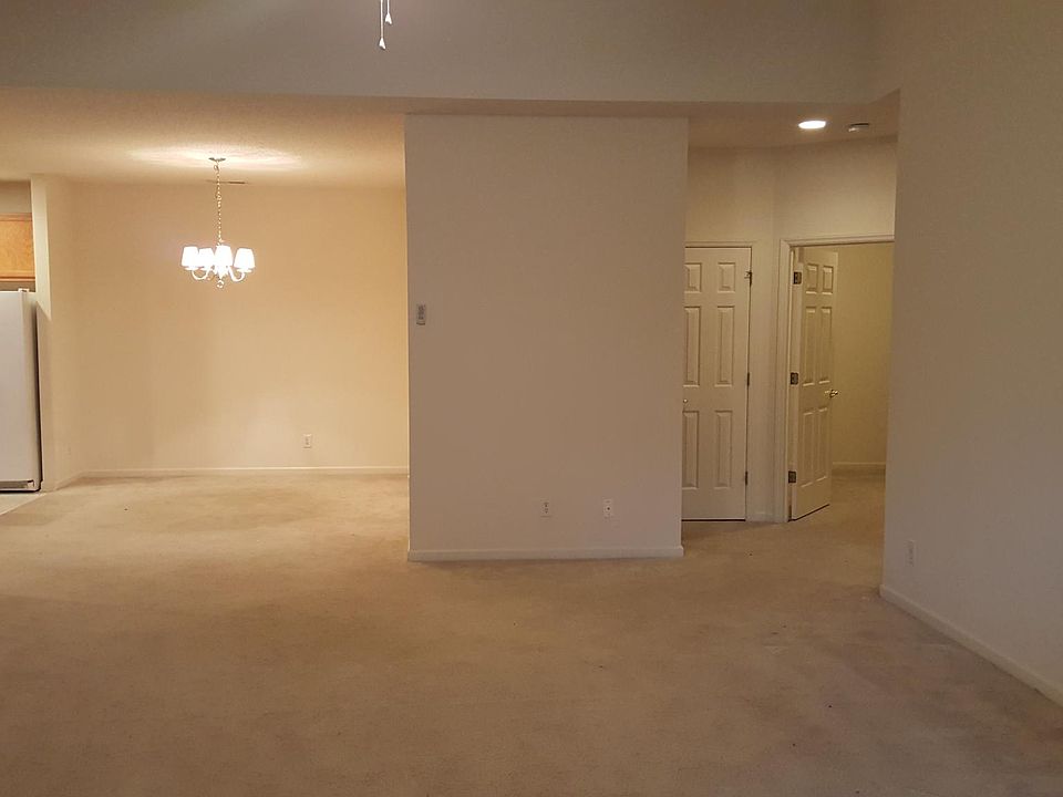 Living Room from the front door showing the Dining Room and