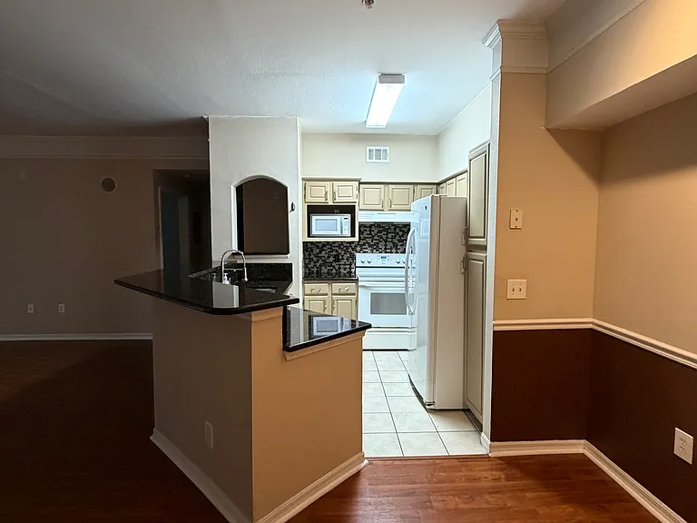 Step inside to an inviting kitchen and living area.