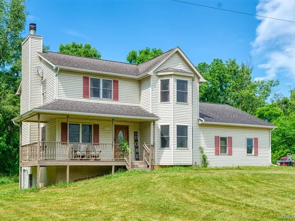 9240 Sober Rd, Fowlerville, MI 48836