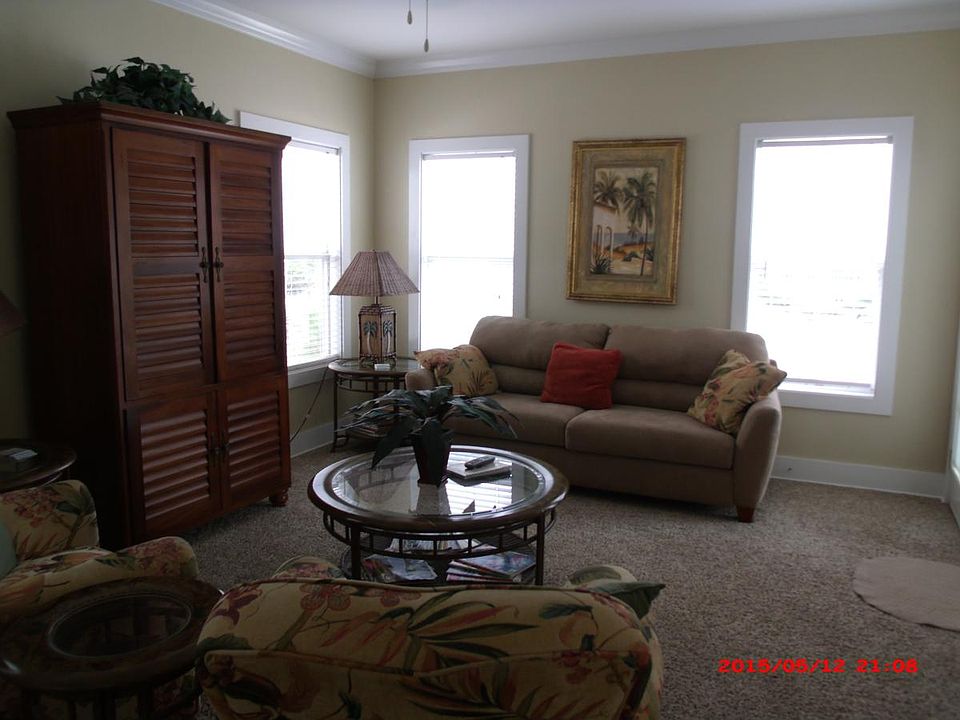 Living room with new sofa sleeper and carpet