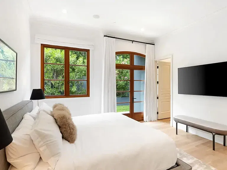 Guest bedroom with TV