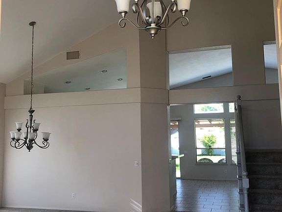 Corridor and front living and or dining space