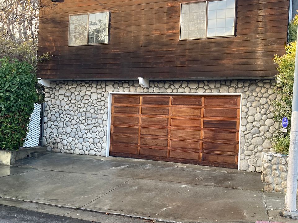 Exterior view of home with oversize two car garage.