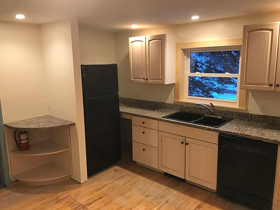 Big kitchen with granite counters, recessed lighting, dishwasher and lots of cabinet space.