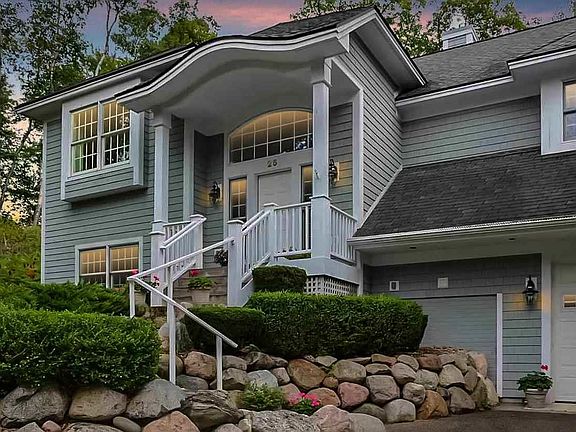 Beautiful stone stair way leads you to this stunning entrance