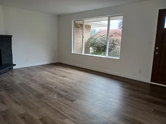 Living room with large window and natural light - 324 181st Pl SW