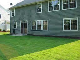 Great lot featuring a private, level yard for pets or kids