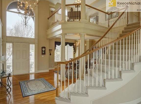 Elegant entry with a dramatic staircase!