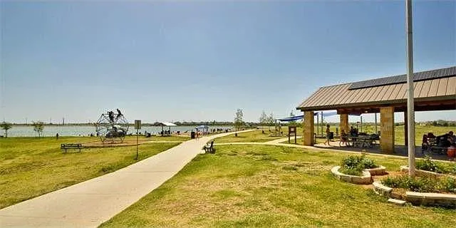 2017 side shot from Weiss Ln of the pavilion and beach area. Improvements have been made recently.