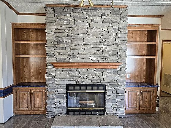 Stone fireplace w/ built-ins