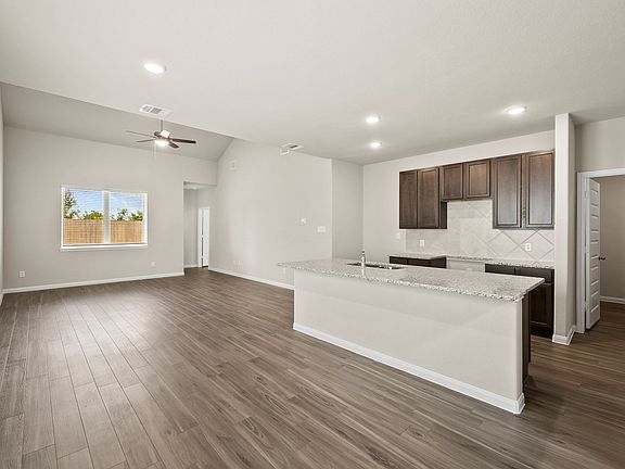 Dining Area to Kitchen and Family Room