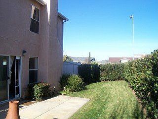 back yard with storage shed