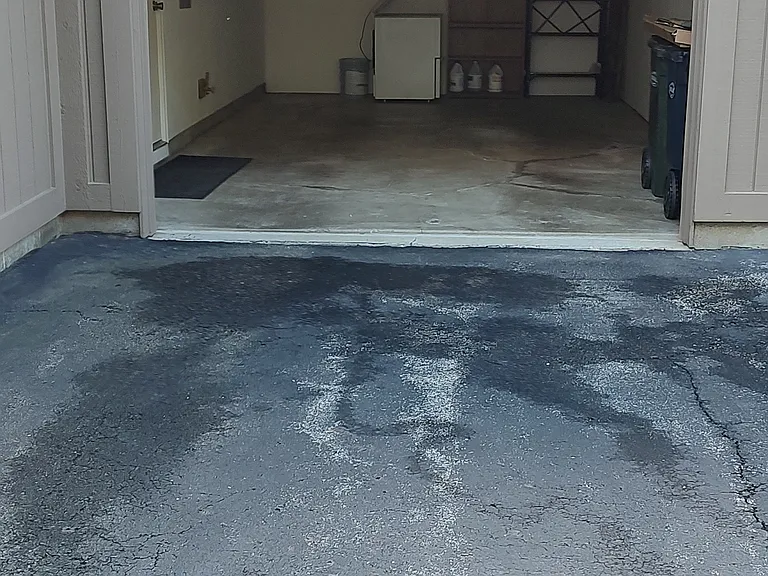 Deep 1 car garage. Attic entry from garage. Garage door opener w/outside keypad. Outside water hose in garage.