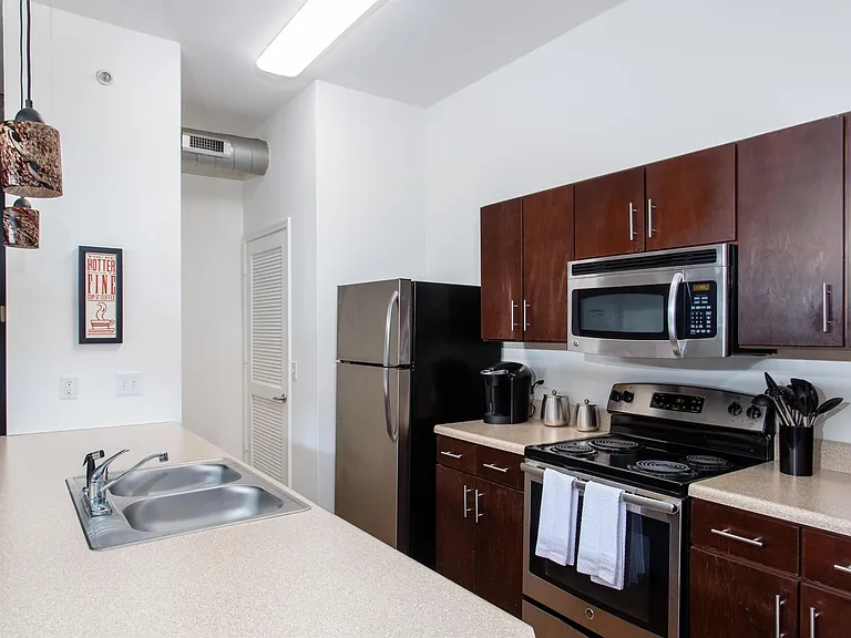 Big Laundry Room, Disposal, Ice Maker, Built In Microwave Oven, and great storage...