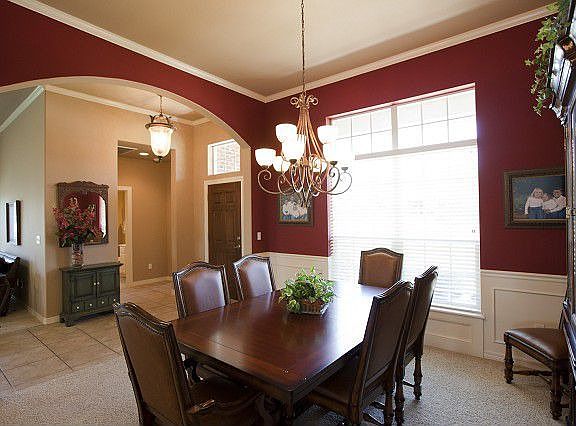 Elegant Formal Dining withclassic wainscoting