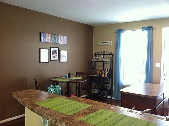 Second Floor: Kitchen leads to the balcony.
