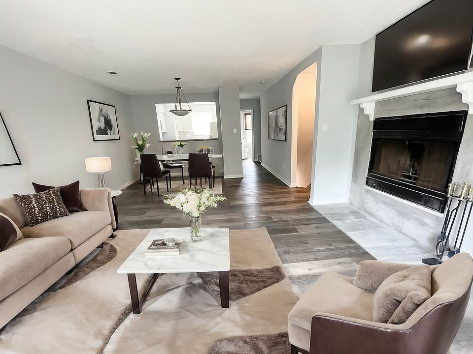 Living Room and Dining Area. AI Virtually staged.