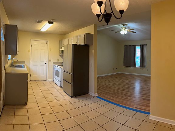 Kitchen, dining area, and living room