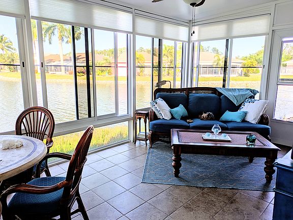 Lanai - blinds up screen windows open