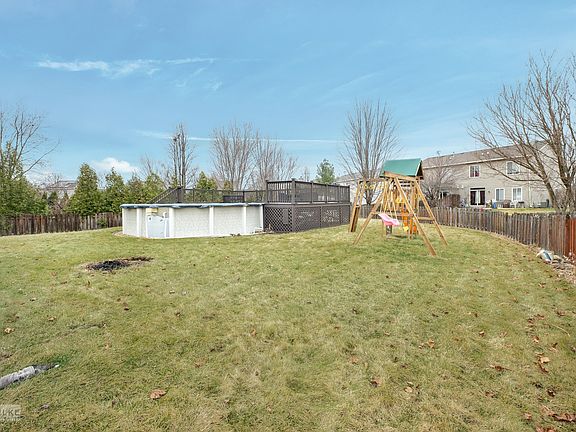 This .25 acre lot is fenced and includes a 21' diameter pool, (new liner in 2018) pool decking, and 