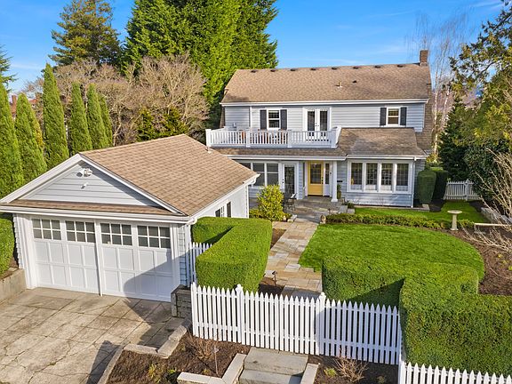 Street-to-street lot with two car garage.