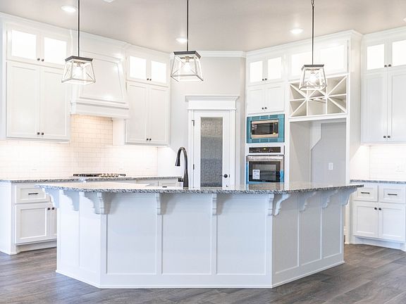 Homes by Taber Mallory Floor Plan with Brick-5025 Sunspear