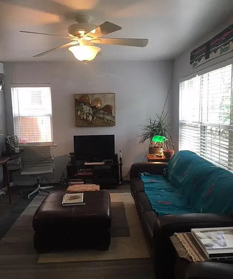 Living room with plenty of natrual sunlight.
