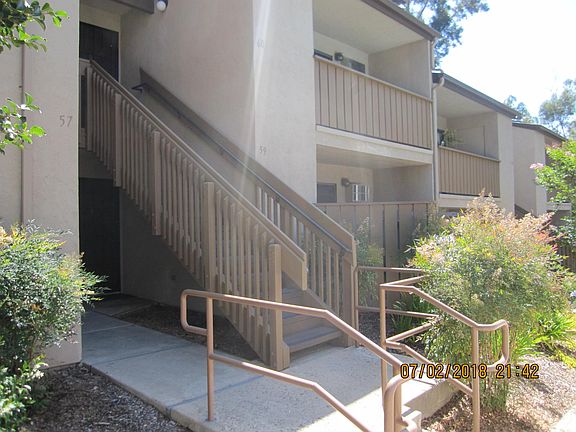Entry to unit #59, it has a screened security door. 