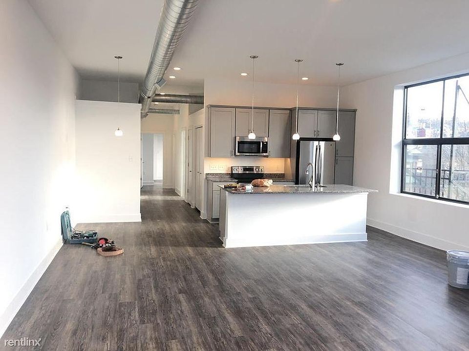 Brand New Space (1 year old)! Looking into kitchen hallway from front window area