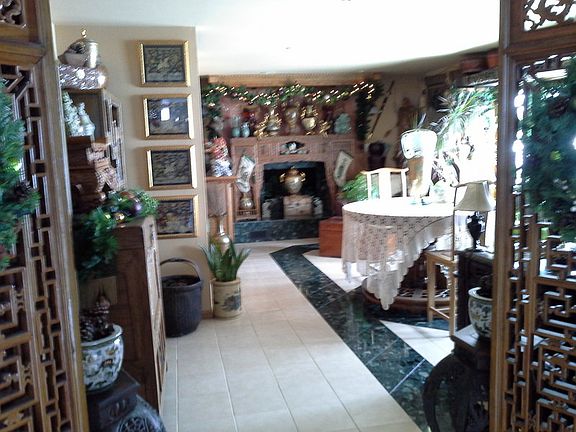 Kitchen and TV Room in background
