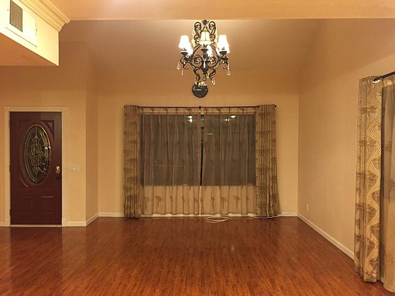 Living room, viewing facing west, front door is on the left